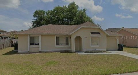 Photo of 927 Kentucky Woods Lane E, Orlando, FL 32824 (MLS # O6404591)
