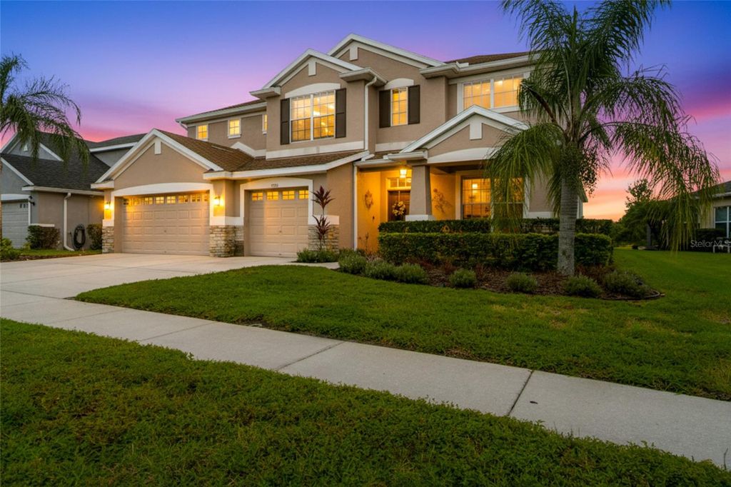 Photo of 2330 Nesslewood Drive, Wesley Chapel, FL 33543 (MLS # TB8432010)