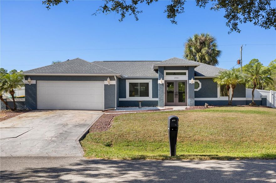 Welcome to your dream home in Port Charlotte! This beautifully updated property feels just like new construction—truly move-in ready and offering everything you’ve been searching for. Featuring 3-bedroom, 2-bathroom pool home with a 2-car garage sits on a desirable corner lot. 
As you enter through the elegant double glass doors, you are greeted by an open floor plan filled with natural light. The high ceilings and the new luxury vinyl flooring installed throughout the entire home in 2023, with no transitions between rooms, create a seamless, modern, and inviting feel. A full wall of sliders opens to the lanai, enhancing the bright and airy atmosphere inside.
The kitchen was fully updated in 2023 and features a spacious island ideal for cooking, entertaining, and gathering with family and friends. All appliances were replaced in 2023 as well. Both bathrooms were also completely renovated in 2023 with stylish, contemporary finishes.
The split-bedroom layout provides ideal privacy, with the master suite on one side of the home and the guest bedrooms on the other. The master suite includes an ensuite bathroom for added convenience. Updated hurricane-impact windows and sliders offer peace of mind during storm season.
Step outside to your own private oasis. The vinyl-fenced backyard is perfect for outdoor activities. A screened-in, solar-heated pool sits on a beautiful brick paver deck, and the large covered lanai allows for year-round outdoor enjoyment in the Florida sunshine. A 10x10 shed, added in 2022, provides valuable extra storage.
Additional upgrades include a new roof installed in 2020 and a well-designed 2-car garage with a laundry area and plenty of storage space. This home truly combines modern comfort with the charm of Florida living.
Located in a desirable Port Charlotte neighborhood, you’ll enjoy convenient access to shopping, dining, schools, parks, entertainment, and more. With its prime location and impressive upgrades, this home is ready for its next owner. Don’t miss the chance to make it yours and experience the Florida lifestyle you've always dreamed of.