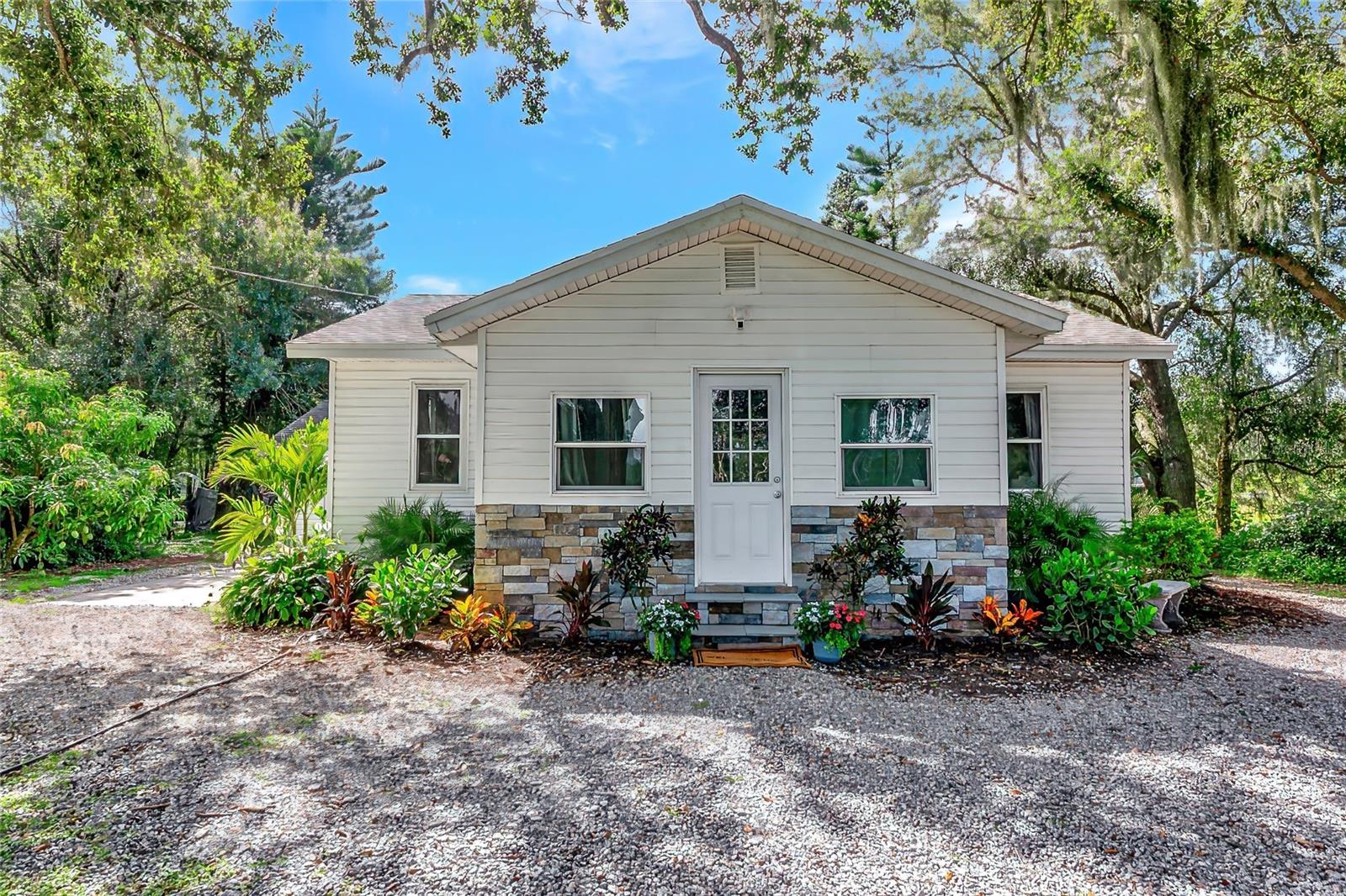 RARE A1-ZONED, 5 ACRE PROPERTY THAT HAS FUTURE MULTI-HOME POTENTIAL FULLY FENCED- Discover the perfect blend of space, versatility, and tranquility on this beautifully remodeled 5-acre property with highly sought after A1 zoning a rare opportunity offering endless possibilities for multi-generational living, rental income, or agricultural use. The primary residence is a charming 2 bedroom, 1.5 bath home, but has 2 additional bonus rooms that if a closet is added becomes a 4 bedroom, which is what they are currently used as. This home has been completely remodeled with modern finishes and thoughtful updates throughout. The open-concept living area features updated flooring, fresh paint, and an upgraded kitchen, making this home move-in ready with style and comfort. Step outside to find a fully fenced estate with plenty of room for animals, gardens, or outdoor recreation. A large work shed, barn, and serene pond add to the property’s appeal, making it ideal for hobby farming, workshops, or outdoor entertaining. Whether you’re looking to build additional structures, host guests in a second home, or simply enjoy wide-open space with privacy, the multi-home potential and flexible zoning adds incredible value. Bring your horses, your toys, or your dreams, there’s room for all of it here. Located in a peaceful, rural setting, yet conveniently close to town, shopping, and major roadways. This is the property you’ve been waiting for, schedule your private showing today and explore the possibilities!