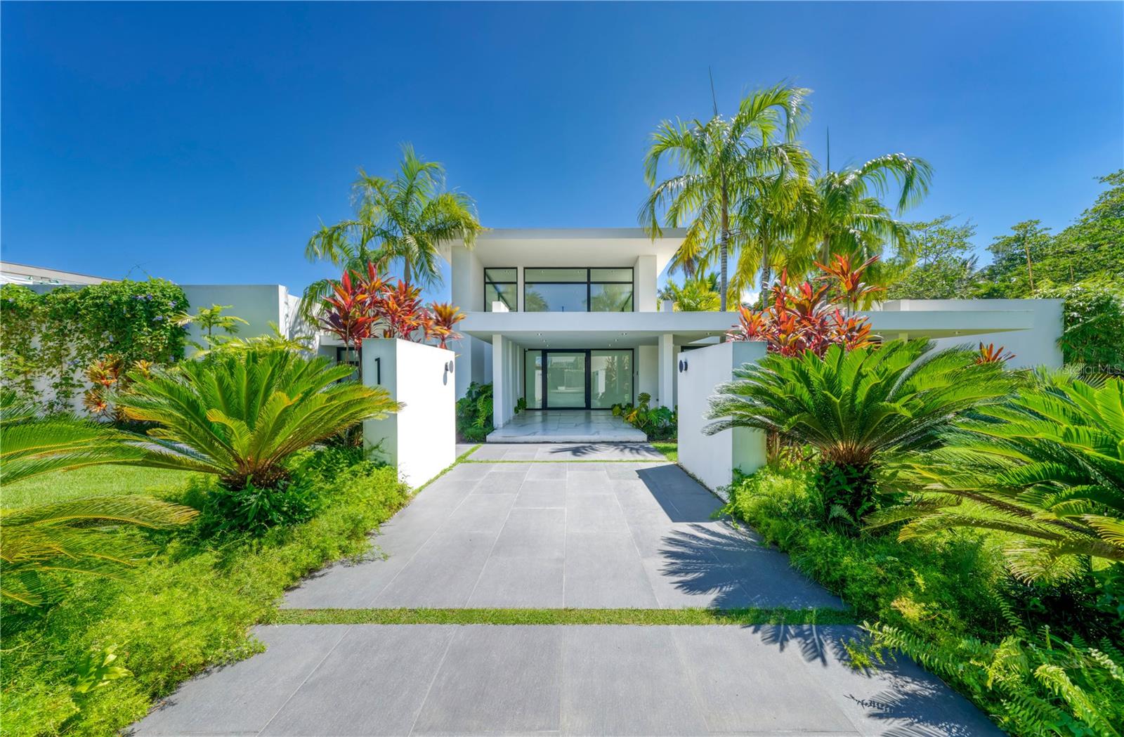 New construction in the iconic Dorado Beach Estates community. Ultra modern residence, ideal for those seeking the privacy of an expansive, exclusive estate sitting on over an acre of property. 4 bedrooms ensuite + den, all on a single level of construction. 13,000 sq. ft living, 15+ ceilings and floor to ceiling glass doors and windows throughout. Kitchen with 15 foot center marble cut island, gas range, Meile and Wolf appliances. 4 car garage with mudroom and storage. The alluring backyard boasts a 60 ft. pool, Jacuzzi and sunning areas along with a full summer kitchen and covered outdoor dining. Lofty and sun drenched, this floorplan features the lush backdrop only Dorado Beach provides.