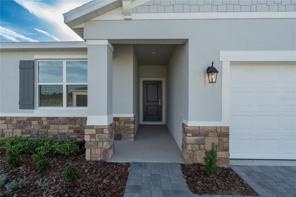 Photo of 5844 Cliffbow Loop, Leesburg, FL 34748 (MLS # O6413507)