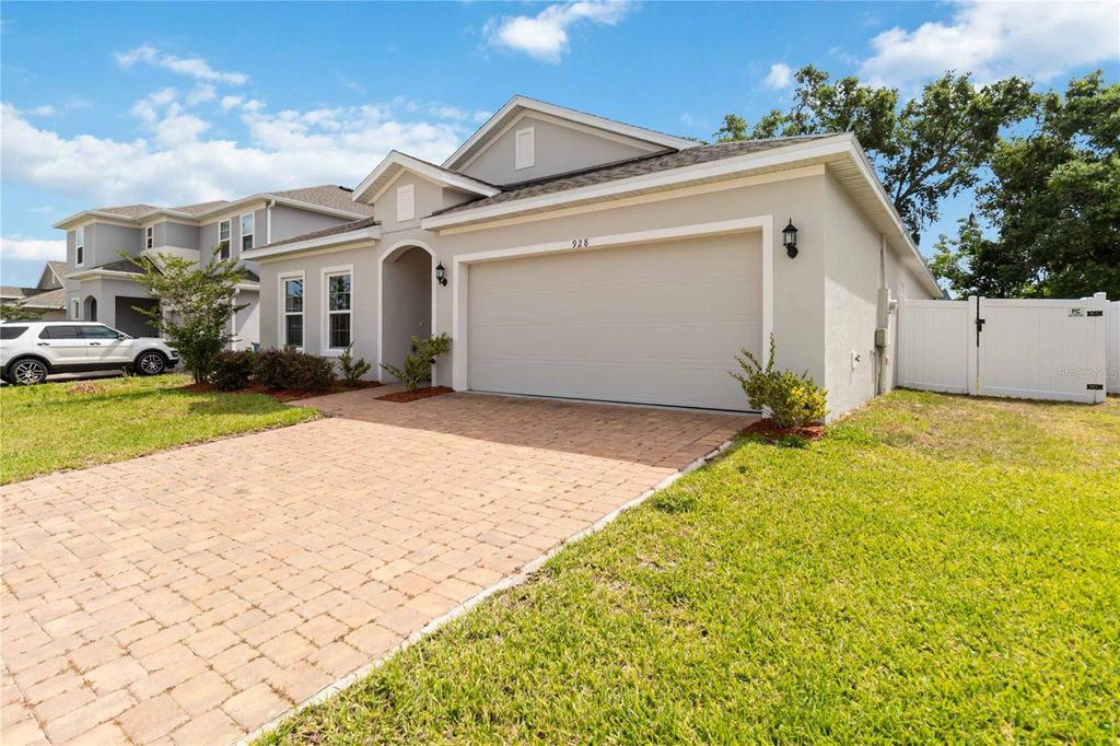 Photo of 928 Avenal Lane, Davenport, FL 33837 (MLS # O6349998)