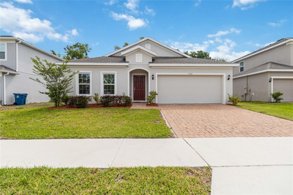 Photo of 928 Avenal Lane, Davenport, FL 33837 (MLS # O6349998)