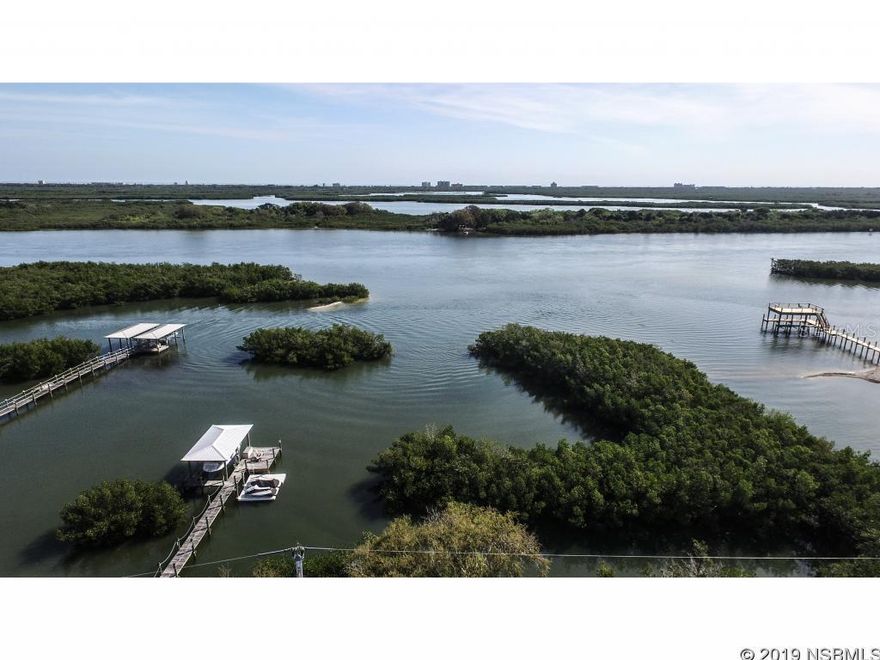 Wake up to a beautiful sunrise each morning in this river front home with gorgeous views of the intracostal. Down stairs features 2 master suites with a studio bedroom and bath upstairs.Dock Concept drawings done and FDEP permit ready. Boaters dream on Direct Intracoastal frontage home, first time offered Lovingly maintained house on the hill with gorgeous views.  Lush landscape a Gardner's dream. This home is perfect for a growing family or artist. Downstairs you have two master suites and upstairs a perfect studio bedroom.  This well maintained oversize lot is perfect for large gatherings. Fish from your front yard or take your boat out on the intracoastal. With a little updating this could be your dream home on the river. INVESTORS WELCOME! Large Corner lot 275 feet deep. Priced below appraisal.  Whole house generator, hurricane shutters on all the windows never be without power. Oversize lot big enough to build guest house or expand home. ;Water: City