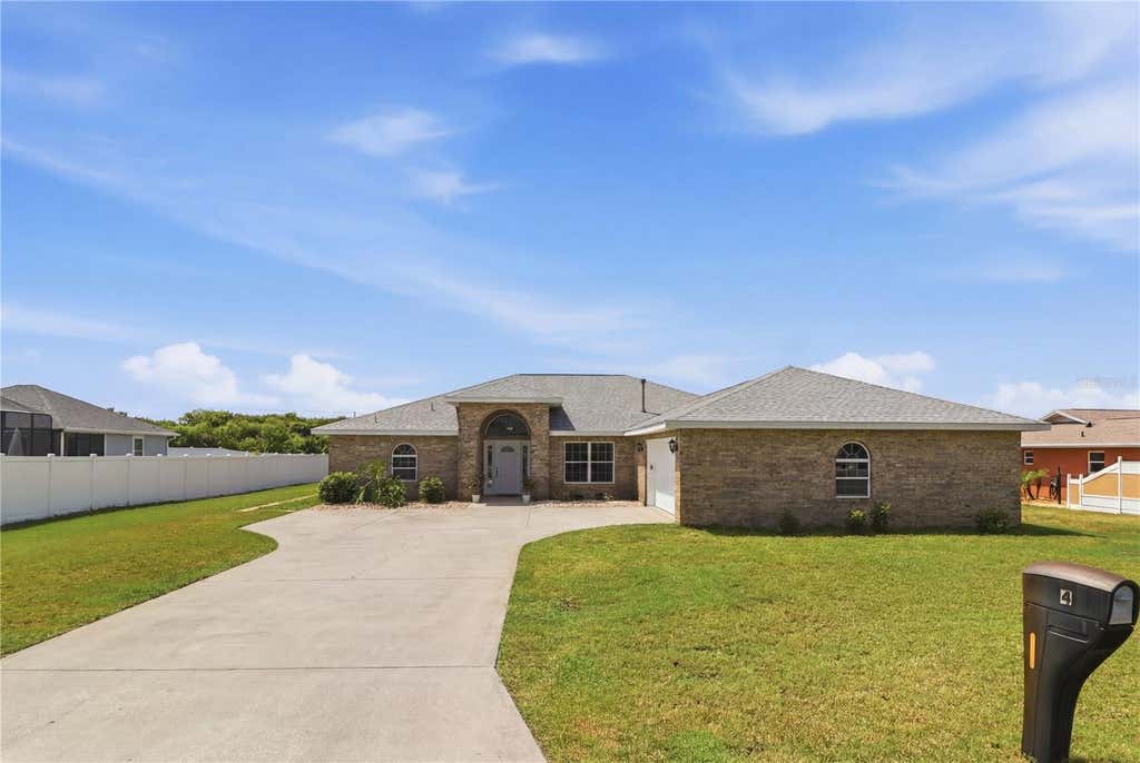 Photo of 4 Beachside Dr, Palm Coast, FL 32137 (MLS # FC319903)