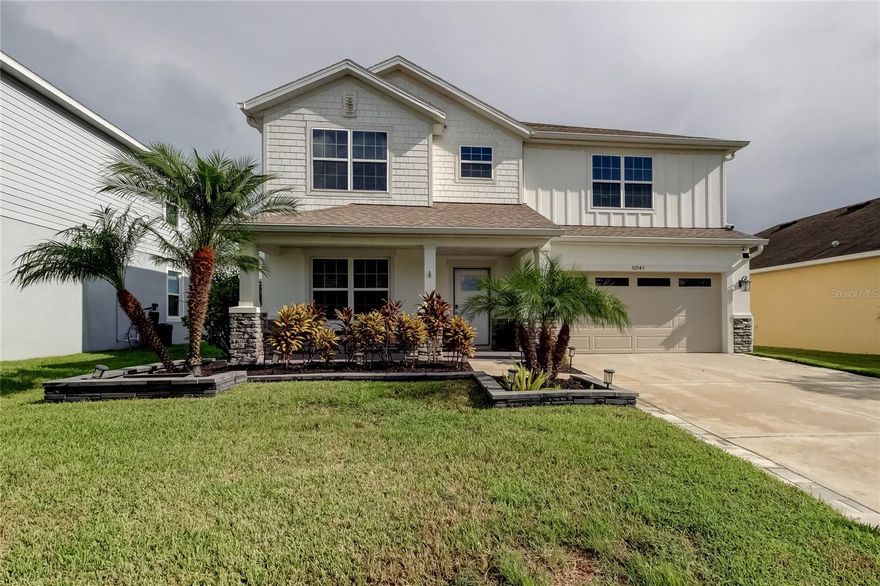 Welcome to Lagoon Living in Epperson! This 6-bedroom + loft home offers space, style, and
upgrades throughout. Fresh exterior paint, widened paver driveway, upgraded builder elevation, and tropical landscaping add great curb appeal.
Inside, the open kitchen overlooks the dining and living areas and features 42" white cabinets with upgraded hardware, granite countertops,
stainless steel appliances, custom backsplash, wood pantry shelving, and water filtration/softener with reverse osmosis. The interior is freshly
painted with crown molding, accent walls, and luxury vinyl plank flooring. Flexible front room works as an office, playroom, or formal dining/living
space, and there’s a downstairs bedroom with full bath—perfect for guests or multi-generational living. Upstairs you’ll find 5 bedrooms, all with
custom closets, plus a loft. The owner’s suite has a tray ceiling, barn door, walk-in closet, and spa-style bath with dual vanities, soaking tub, and
walk-in shower. Bathrooms have marble countertops. Outdoor living includes a covered lanai, extended paver patio, and spacious fenced yard.
Added features: 50-amp power inlet box, transfer switch, and upgraded garage storage. Located in Epperson South, home of the nation’s first
Crystal Lagoon with kayaking, paddle boarding, sandy beaches, live music, swim-up bar, dog parks, golf cart paths, and resident-only events.
Close to great schools, shopping, dining, and just 35 minutes to downtown Tampa.
