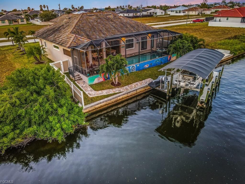 Photo of 1219 Old Burnt Store Road N, Cape Coral, FL 33993 (MLS # O6397763)