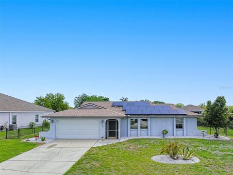 Photo of 390 Tres Lagoas Street, Punta Gorda, FL 33983 (MLS # C7524212)