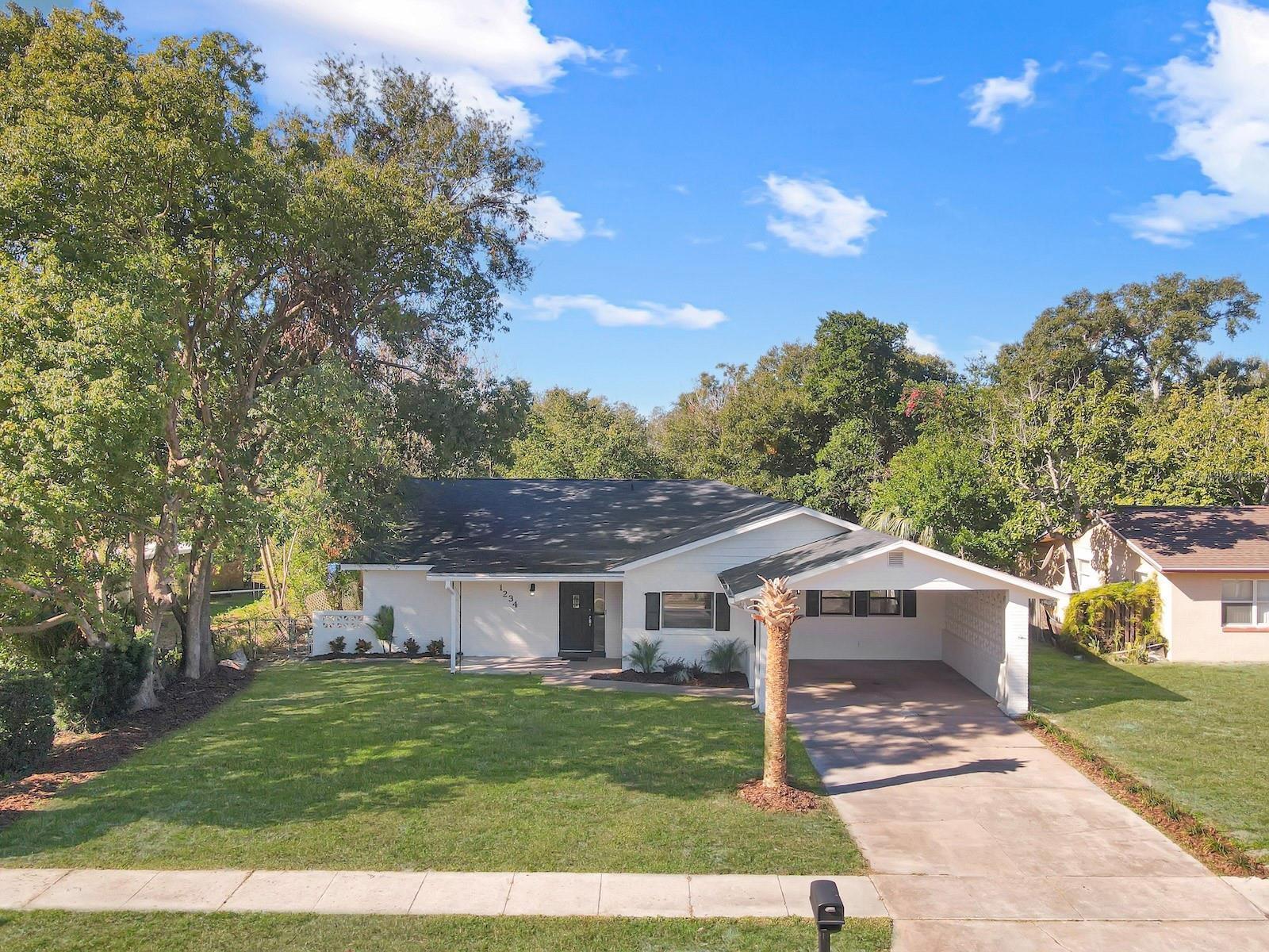 One or more photo(s) has been virtually staged. Welcome to this beautiful fully remodeled home, located at 1234 Lynwood Ave, Apopka. This charming property combines modern design with comfort, making it the perfect place to call home. PRIVATE ACCESS TO BEAR LAKE!!. Every detail has been carefully updated to create a stylish and functional living space. The main home features 4 spacious bedrooms and 2.5 bathrooms with a well-maintained layout. It also includes an additional 1-bedroom, 1-bathroom apartment complete with its own kitchen and living room, offering the potential for rental income or guest accommodation. This stunning property offers access to 310-acre, spring-fed Bear Lake through a community lot, providing a perfect retreat for outdoor activities like boating and fishing. Ideal for Large Families! This 5-bedroom, 3.5-bathroom home is ideal for families seeking ample space in a sought-after, family-friendly neighborhood. The home is zoned for excellent schools and is designed to meet the needs of a growing family. It’s turnkey and move-in ready, with updates including a new roof (2019), new AC (2024), complete re-piping (2021), and fresh interior paint. The newly designed landscaping with a lush lawn enhances the curb appeal, making it even more inviting. Plus, the fenced backyard and screened-in lanai wish private outdoor oasis for relaxation and entertaining. Unique Features & Benefits: No HOA. Easy access to I-4, restaurants, and the Altamonte Shopping Mall. This home offers an exceptional opportunity for those looking for a modern, spacious residence in a prime location, with the added bonus of lake access and potential income from the second living quarters. DON’T MISS THE CHANCE TO RENT THIS BEAUTIFUL PROPERTY!!