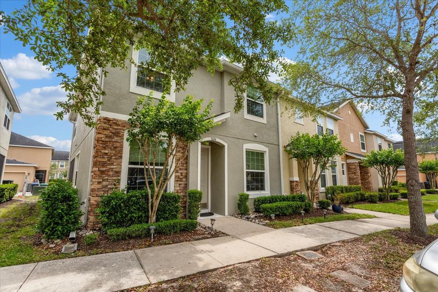 Welcome to 3054 Merak Alley, located in the desirable community of Avalon Town Center. This well-maintained corner end unit townhome was built in 2015 and offers 4 bedrooms and 2.5 bathrooms, and boasts over 1700 square feet of living space. Step inside to find a bright and airy floor plan featuring a beautiful kitchen with granite countertops, 42” cabinets, recessed lighting, stainless steel appliances, and a spacious pantry with extra storage. The living room/dining room combo opens up off the kitchen and offers high ceilings, 12” tile flooring and sliding glass doors that give you access to the updated screened-in patio. It's rare to find a newer unit in this community offering a 4th bedroom on the first level that could be used as an office or guest bedroom at this price point. On the 2nd level, you’ll love the spacious primary suite, featuring a walk-in closet and a spa-like bathroom complete with dual vanities and a separate walk-in shower. The 2 additional bedrooms are ideally situated near the guest bathroom, complete with a shower and tub combo. Additional highlights include upstairs laundry, double-pane windows, an attached rear-entry 2-car garage with overhead storage, an updated AC/thermostat (2022), and a new water heater. Residents of this community also enjoy access to exceptional community amenities such as a community pool, playgrounds, tennis courts, basketball courts, and a fitness center, just to name a few. The HOA also covers exterior maintenance, landscaping, and even basic cable and internet, offering added convenience and value. This home is conveniently located just minutes from SR417, 408, UCF, Valencia College, and Avalon Park and delivers the perfect blend of lifestyle and location in one of East Orlando’s most vibrant neighborhoods. Don't miss your chance to enjoy maintenance-free living and make this beautiful townhome your new home!