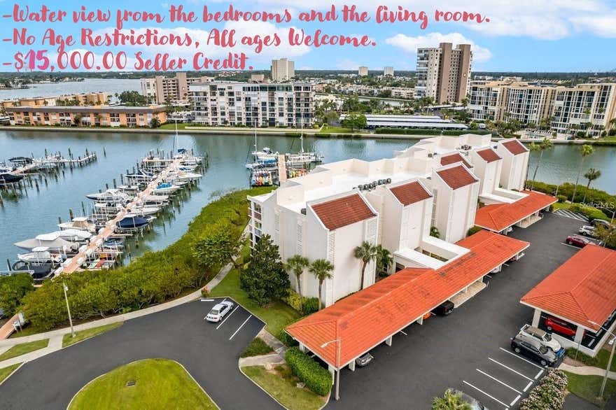 Motivated Seller:

* 2026 Estimated Real Estate Taxes Credited to the Buyer.
* 3 Months of Condo Fees Paid By the Seller.
* $15,000.00 Credit Offered Towards Upgrades.

Enjoy Some of Florida’s Best Living, Very Close to World-Famous Beaches. The Harbourside Gated Community has Everything to Offer. A stunning view over the marina to Boca Ciega Bay, this 2-Bedroom, 2-Bath Condo can be your Piece of Paradise. The view is enjoyed from the expansive balcony, divided into both outdoor and indoor spaces, and accessed through sliding glass doors from the living room and the Master bedroom. This condo features Motorised hurricane shutters and wood laminate flooring in the open concept living/dining area. There is porcelain tile flooring in the kitchen, a pantry closet, and ample cabinet storage space. The bathrooms have porcelain tile floors, vanities, and circular glass vessel sinks. Each bedroom has a walk-in closet, and the bedrooms are large enough to comfortably accommodate a king-size bed. The second bedroom has matching built-in cabinets and bookcases. The Master Bedroom features great waterfront views and an en-suite bathroom. The utility closet provides a newer washer and dryer. The Units covered assigned parking is steps from the elevator.

Harbourside is a resort-style condo community with 6 pools, 5 tennis courts, pickleball courts, a clubhouse with a library and craft shop, 2 fitness centers including saunas, a wood shop, 3 car wash stations including air/vacuums, shuffleboard, and outdoor grilling areas. EV Charging Stations, and a 1.5-mile walking trail around the community perimeter. The Marina has boat slips and kayak storage available for rent. The Yacht Club plans social events throughout the year.  There are No age restrictions at Harbourside. All ages are Welcome. Harbourside has its own dedicated traffic light that allows access to the main road. The city of South Pasadena, with shopping, supermarkets, restaurants, a fire station, and a hospital, and the town of St Pete Beach are easily accessible from the community.

This is a 2nd-floor condo on High Ground with no damage from recent storms.
Savannah Condo has completed its Milestone Reports and is fully up to date.
Schedule your private showing today.