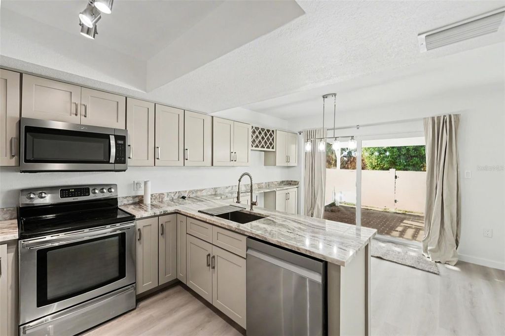 Photo of 1640 Cape Hope Avenue NE #4, St Petersburg, FL 33702 (MLS # TB8490769)