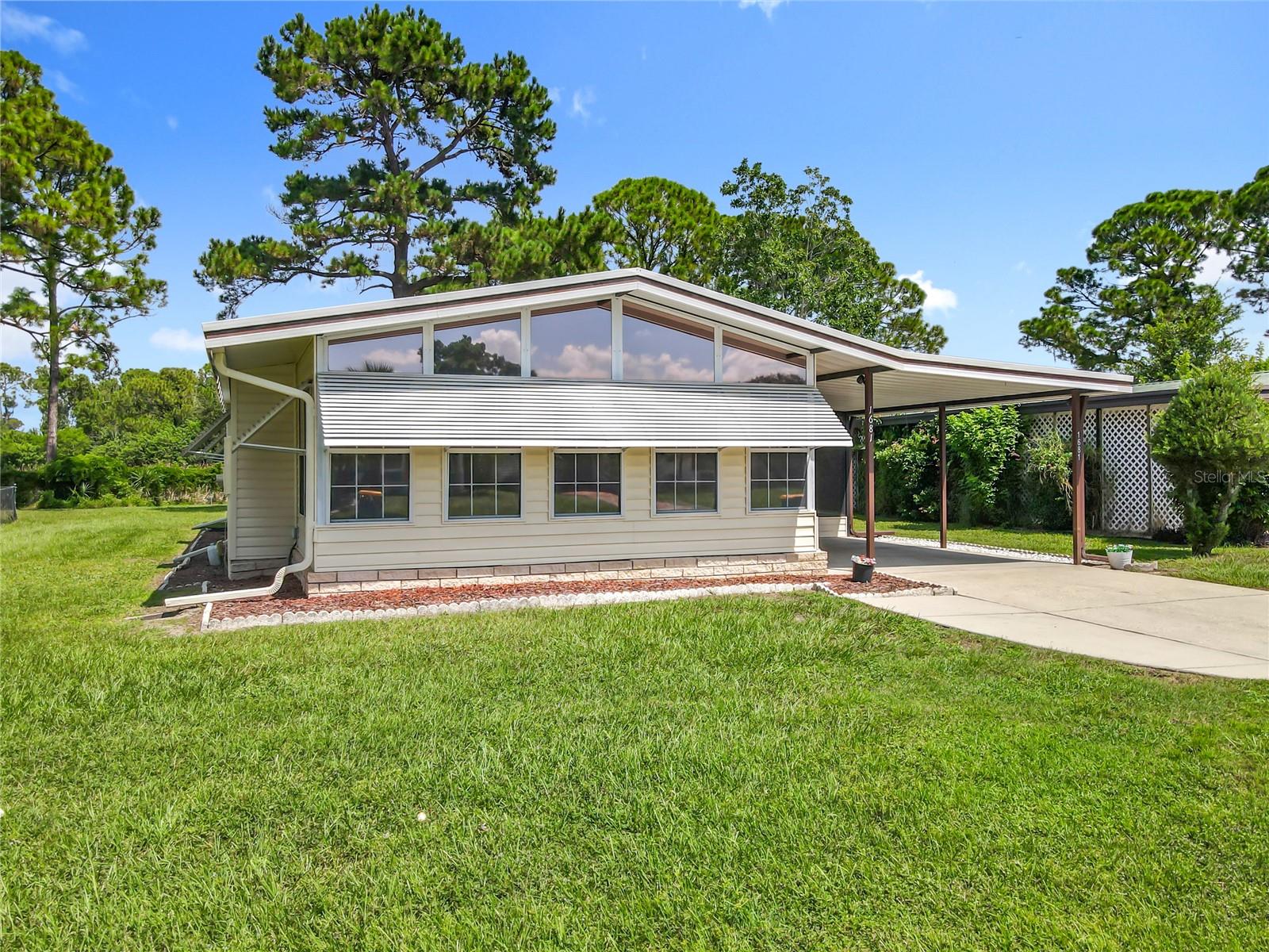 "Welcome to Lake Frances Estates, a vibrant 55+ community in Tavares where life is easy and fun! This charming 2-bedroom, 2-bathroom home boasts a spacious family room perfect for entertaining, with plenty of natural light and views of the surrounding neighborhood. The seller, recently relocated due to a life change, is motivated to sell this solid and well-maintained home. Enjoy your morning coffee in the serene screen room or head out to your workshop. As a resident of this golf cart-friendly community, you'll love the convenience of cruising to the nearby grocery store, restaurants, and shops. Plus, take in the breathtaking sunsets without the hassle of downtown parking. Lake Frances Estates is renowned as one of Lake County's best communities - make it yours today!"