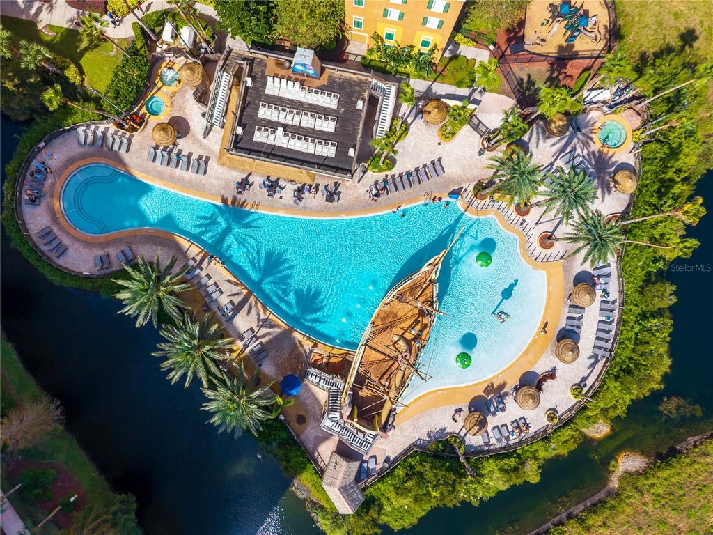 Photo of 8125 Resort Village Dr #5502, Orlando, FL 32821 (MLS # O6452558)