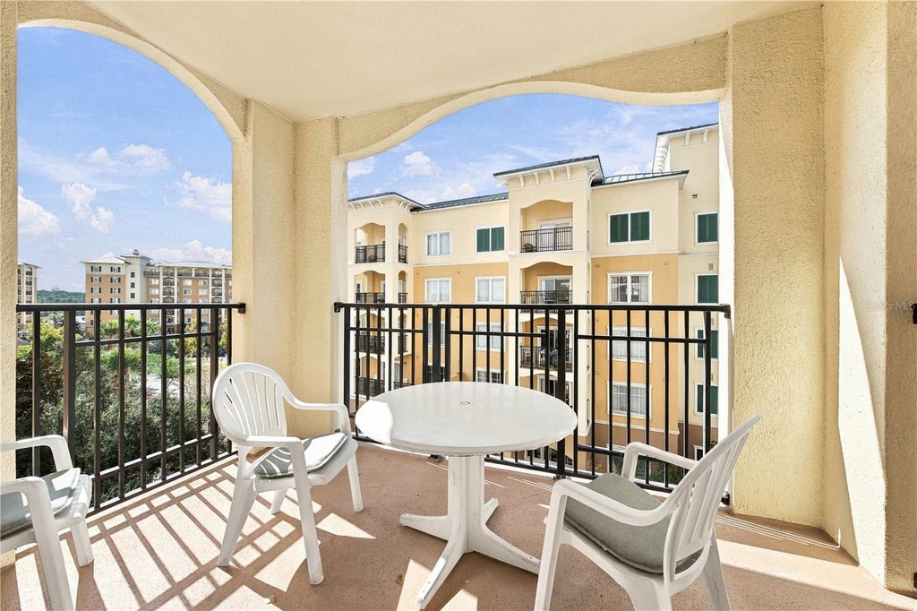 Photo of 8125 Resort Village Dr #5502, Orlando, FL 32821 (MLS # O6452558)