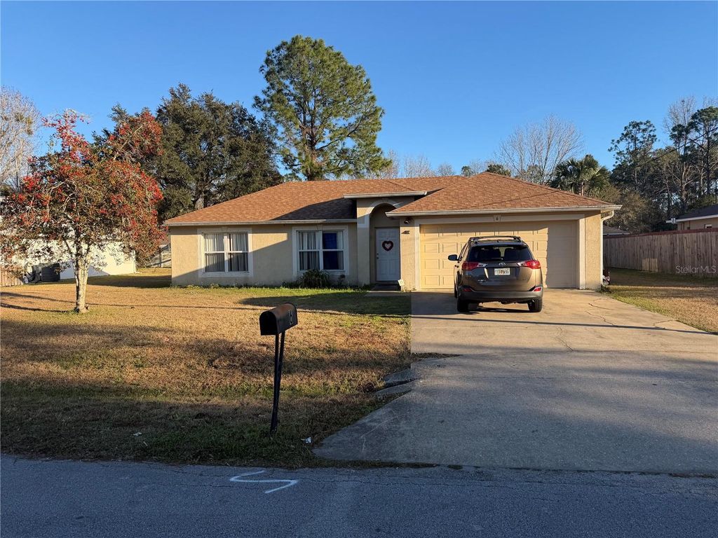 Photo of 6 Pebble Stone Lane, Palm Coast, FL 32164 (MLS # FC315678)
