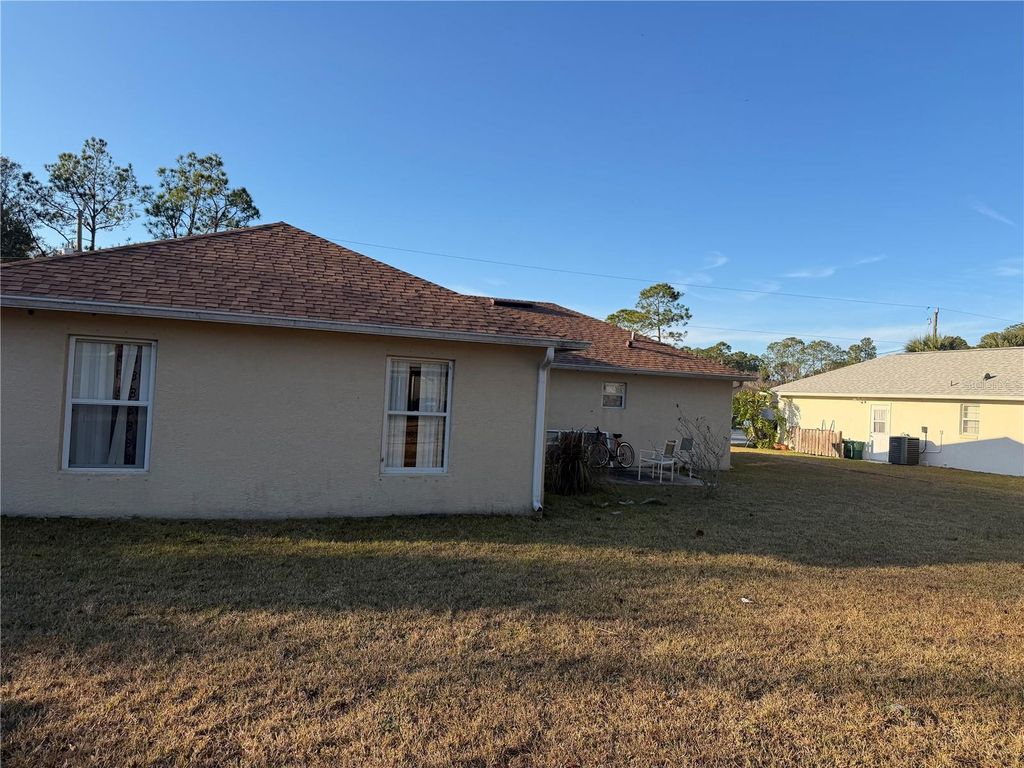 Photo of 6 Pebble Stone Lane, Palm Coast, FL 32164 (MLS # FC315678)