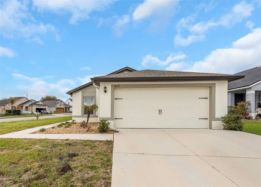 Welcome to the stunning Cocoa floor plan by LGI Homes, nestled in the highly sought-after, amenity-rich community of Spring Ridge! This beautifully designed one-story home offers the perfect blend of comfort, style, and functionality. Featuring an open-concept floor plan, this home includes 3 spacious bedrooms and 2 baths. The modern kitchen is a true centerpiece, complete with energy-efficient appliances, expansive countertops, gorgeous wood cabinetry, and sleek brushed nickel hardware—perfect for both everyday living and entertaining. The primary suite is a relaxing retreat, boasting a massive walk-in closet and plenty of space to unwind. Additional highlights include a large utility room, an attached two-car garage, and a covered back lanai for outdoor enjoyment. Living in Spring Ridge means enjoying true resort-style living with an impressive lineup of amenities, including a community clubhouse, junior Olympic-sized swimming pool, fully equipped fitness center, basketball courts, picnic and barbecue areas, scenic walking paths, open green spaces, and a playground—perfect for gathering, relaxing, and staying active year-round.