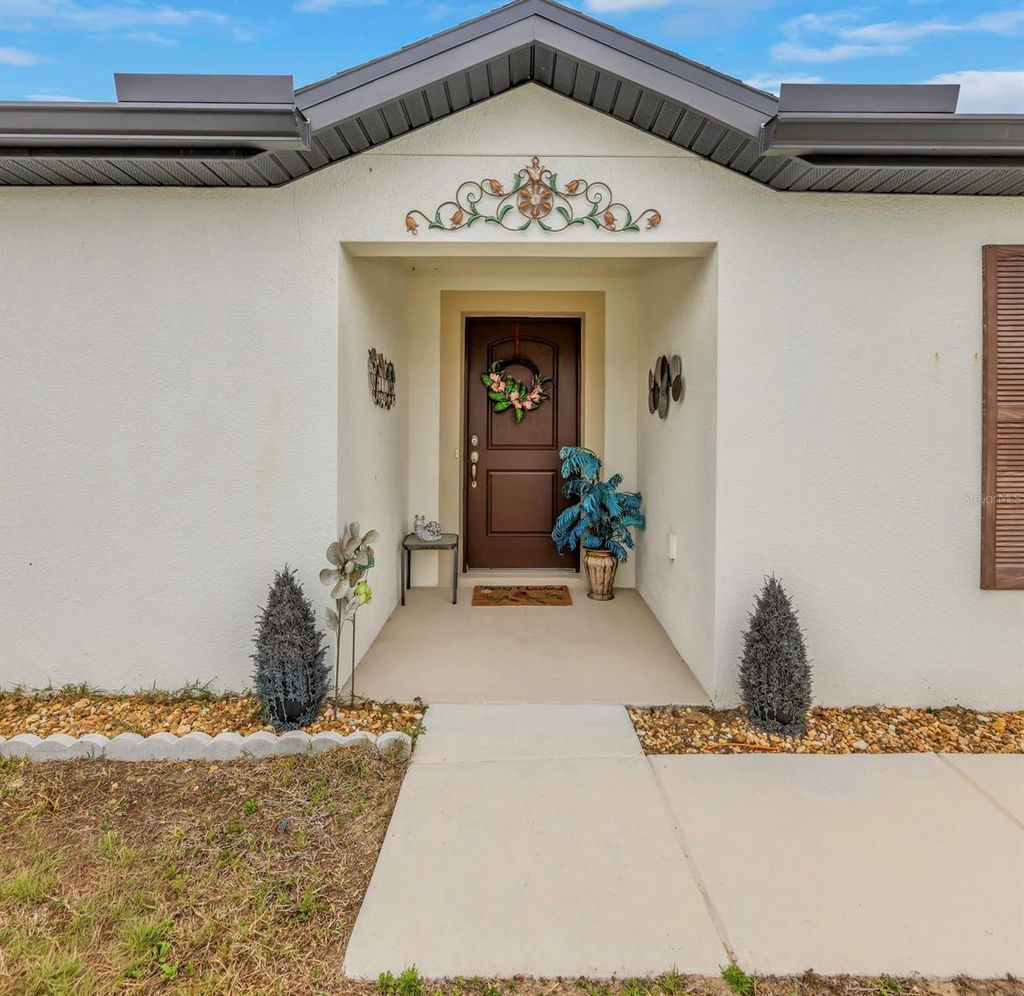 Photo of 8635 Pinetop Ridge Lane, Brooksville, FL 34613 (MLS # TB8491453)