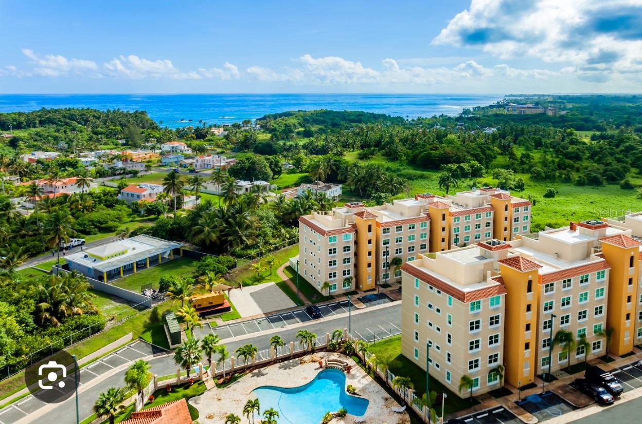 Spectacular 3-bed, 2.5 baths penthouse with unobstructed panoramic ocean and forest views and a constant coastal breeze. Enjoy your private patio for unforgettable sunsets, a modern kitchen, spacious living and dining areas, and 2 assigned parking spaces. The second floor features a family room or den with its own kitchen and half bath — perfect for entertaining guests or hosting gatherings. The building offers a full power generator and water cistern serving the entire complex. Resort-style amenities include a pool, jacuzzi, elegant clubhouse, sports courts, and lush walking trails. Only 2 minutes to Cerro Gordo Beach, scenic walking trails, and MTB routes — and just 4 minutes to Dorado’s beautiful beaches, dining, shopping, and golf.