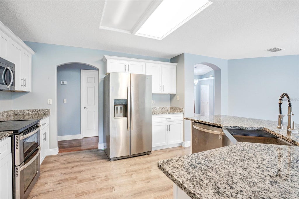 Photo of 14203 Vista Del Lago Boulevard, Clermont, FL 34711 (MLS # O6437943)