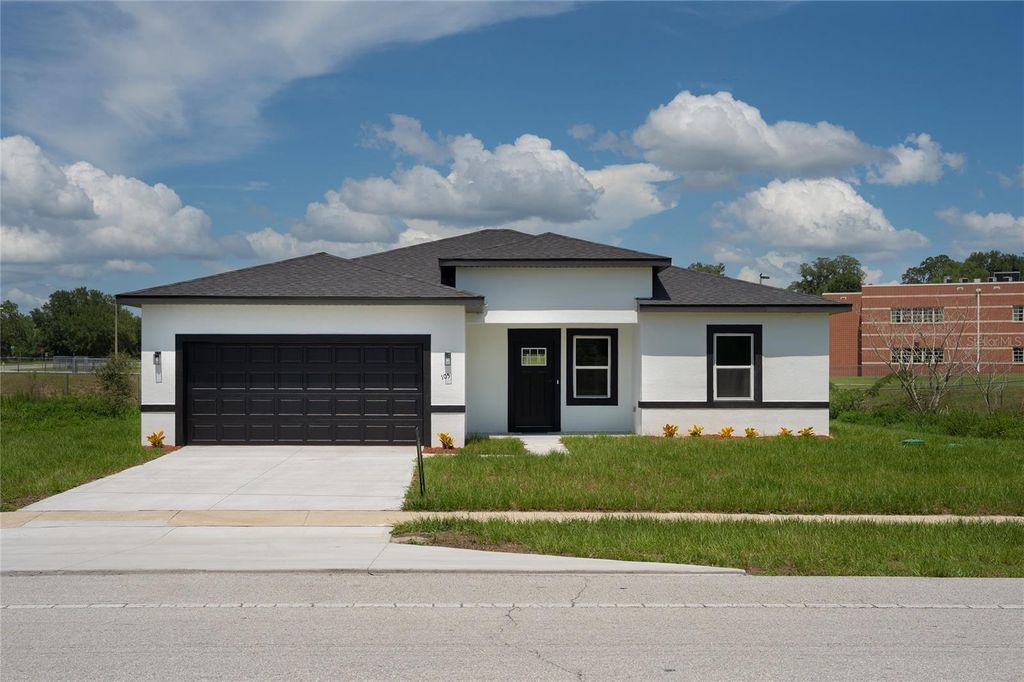 Photo of 105 Marion Oaks Course, Ocala, FL 34473 (MLS # O6325964)