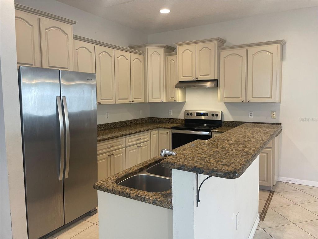 Photo of 646 Norfolk Street, Dunedin, FL 34698 (MLS # TB8456956)