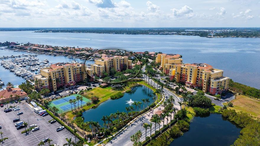 Be amazed by the spectacular views overlooking the Riviera Dunes Marina, known as one of the protected West Coast Florida harbors. Enjoy watching colorful sunrises and dolphins occasionally passing by from your balcony. A boaters and fishermen’s paradise with quick, easy access to Tampa Bay, Intracoastal Waterway, Anna Maria Island and the Gulf. Boat slips can be available for rent and/or purchase by owners. The kitchen has been upgraded and offers an eat-in area, stainless steel appliances, granite counters and solid wood cabinetry. The primary suite has expansive water views, a walk-in closet, dual vanities, and a separate tub and shower. Other important aspects include new roof (2025), 24-hour guard-gated entrance, an office/den with French doors and built-in cabinets, an indoor laundry room with extra storage, 9-foot floor-to-ceiling hurricane-impact glass sliders, a bright two-bedroom, two-bath open floor plan, electric car stations and covered parking with plenty extra parking for quests. This is a pet-friendly, maintenance-free community and provides a beautiful waterside temperature-controlled (for cold and warm weather) pool, hot tub, clubhouse, gym, covered pavilion with two gas grills, tennis and pickleball courts. Entertain family and friends with live music at the Dockside Grill restaurant next door at the marina or enjoy all the exciting events and festivities offered at the new Bradenton Area Convention Center and Marriott Hotel Resort & Spa close by. Minutes to Anna Maria Island Gulf beaches, University Town Center with an abundance of fine dining and shopping, Manatee Performing Arts Center, new Herrig Center for the Arts, Riverwalk and Emerson Point Preserve. Easy access to Interstate 75 & and Interstate 275, Sarasota, Tampa, St. Petersburg and three international airports. Look no further and make this the Florida lifestyle home you deserve.