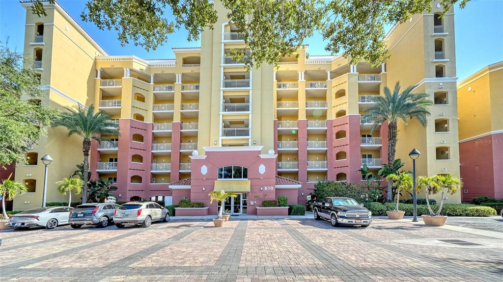 Photo of 610 Riviera Dunes Way #306, Palmetto, FL 34221 (MLS # A4673312)