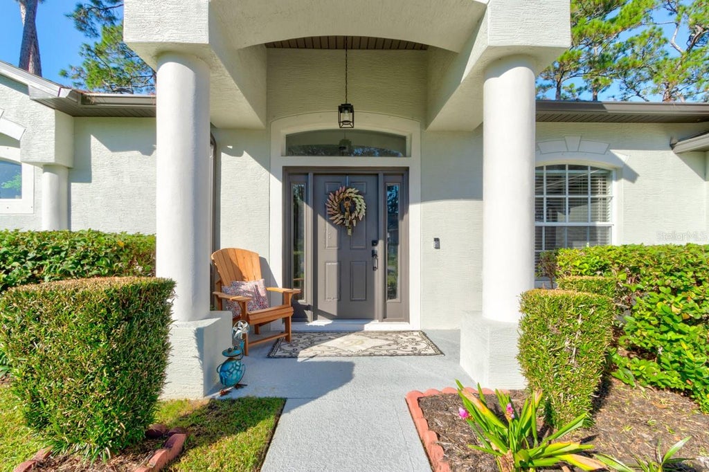 Photo of 37 Woodlyn Lane, Palm Coast, FL 32164 (MLS # FC321817)