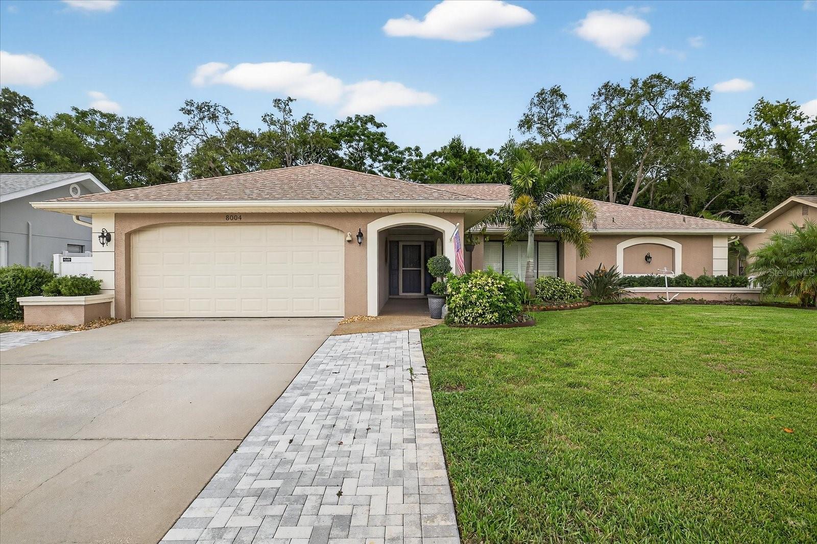 Bring your offers - OWNER MOTIVATED!! Welcome to your dream home in the highly desirable deed-restricted community of Lakeside Woodlands, where exceptional living meets unparalleled convenience. This stunning three-bedroom, two-bathroom residence spans 2,373 square feet of well-maintained living space.
Step inside and discover a thoughtfully designed floor plan that seamlessly blends comfort with functionality. Spacious living areas flow effortlessly throughout, creating an inviting atmosphere perfect for relaxation and entertaining. The beautifully appointed kitchen serves as the heart of the home for gatherings. Each of the three generously sized bedrooms offers peaceful retreats, with the primary bedroom providing a private sanctuary complete with its own ensuite bathroom.
What truly sets this property apart is its spectacular outdoor oasis that transforms your backyard into a personal paradise. The sparkling pool is perfect for hot Florida days when you want a refreshing dip or to float your worries away. The covered lanai extends your living space outdoors, providing the ideal spot for morning coffee, evening cocktails, or hosting memorable barbecues. This outdoor room becomes a year-round extension of your home.
The mature landscaping creates a lush, tropical ambiance with minimal maintenance while delivering maximum visual impact. Established trees and thoughtfully placed plantings provide natural privacy, creating a serene environment that feels like your own private resort.
Location delivers on all fronts. Situated conveniently near major thoroughfares, your daily commute becomes effortless while maintaining peaceful residential living. Proximity to shopping, dining, and entertainment means you're never far from life's conveniences. Residents can easily access beloved waterfront destinations like the famous Sam's Beach Bar, where live music and exceptional seafood create perfect weekend adventures.
The deed-restricted community of Lakeside Woodlands provides peace of mind through maintained property standards that protect your investment while fostering neighborhood pride, ensuring lasting value for years to come.