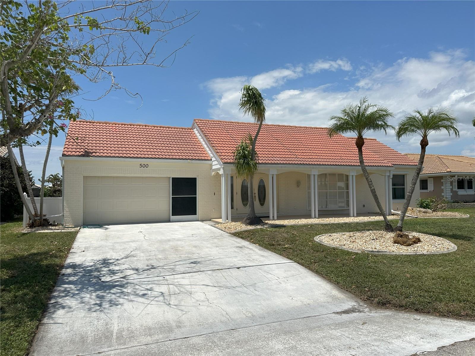 “Annual Rental” Beautiful 3-bedroom, 2-full bath, 2-car garage waterfront home in highly sought after residential community of Punta Gorda Isles. This home has a large private, heated swimming pool with an amazing view of the canal. Beautiful water views from the Master bedroom, Living Room and Guest Bedroom. From the private boat dock, it is less than 15 minutes ride to Charlotte Harbor and to the Gulf of Mexico. The paved pool deck is spacious and inviting to host your private parties. Situated in the Historic District of Punta Gorda, this house is within a radius of 3 miles from Fishermans Village, parks, restaurants, shopping and recreation. Whether you want to relax by the pool, go fishing or boating, or enjoy the local attractions, this house is the perfect place to call home during your stay. Pool maintenance is included in the rent. The pool cage was destroyed, and the boat lift made non-operational by hurricane Ian.