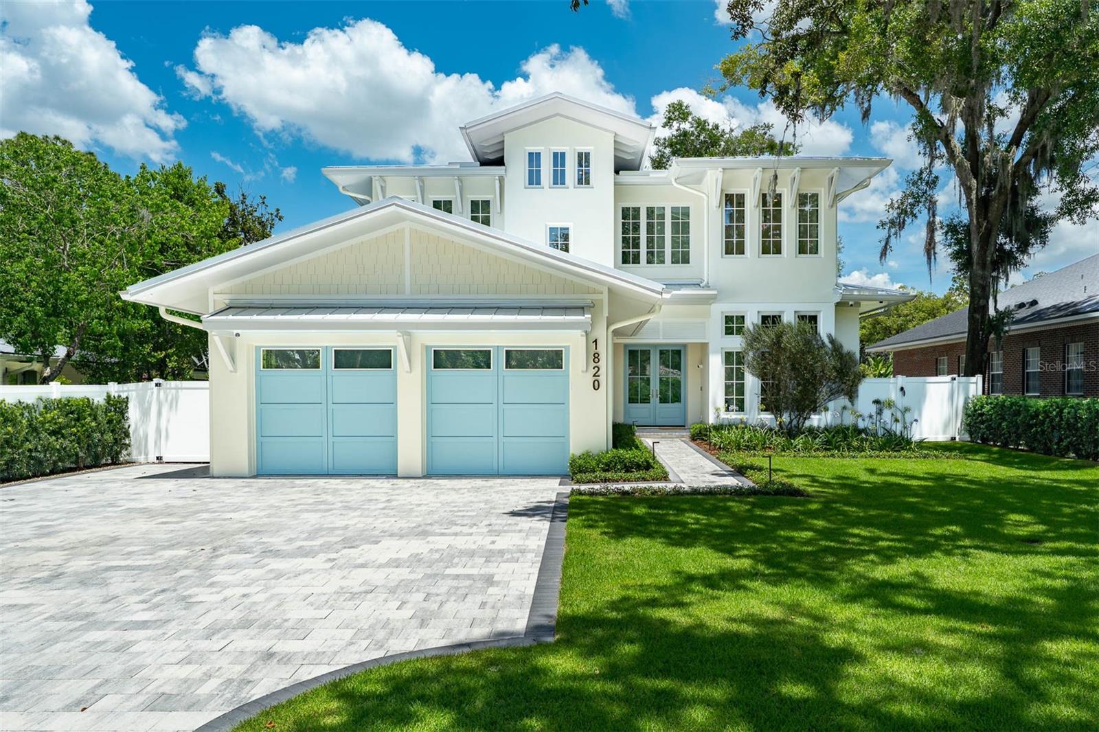 Welcome to your dream home—a masterfully designed, Dutch West Indies-inspired custom residence that blends timeless elegance with modern luxury. Built by FG Schaub Custom Homes, this home features five bedrooms, five full bathrooms, two half bathrooms, and a dedicated home office, all thoughtfully designed for comfort and sophistication within 4,055sqft. of living space.
Stepping into the grand entrance, Anderson windows bathe the home in natural light and offer seamless indoor-outdoor living. The open-concept layout flows effortlessly, perfect for both relaxed living and elegant entertaining. At the heart of the home is a chef’s dream kitchen, outfitted with top-of-the-line Wolf / Sub-Zero appliances, sleek custom wood cabinetry offering an abundance of storage and a generous quartz island. The great room, located directly off of the kitchen is equipped with a wet bar, wine column and a gorgeous, tiled electric fireplace that invites gathering. Making your way around the first floor, you'll also find a full guest suite, the main laundry room, dining space and a luxurious first floor primary suite complete with a spacious custom closet and spa-like bathroom that features dual vanities, an oversized soaking tub, walk-in shower, towel warmer and a private water closet. Head up the custom oak staircase with a steel tubing handrail system to the second floor that features a dedicated office, powder bathroom, activity space and three large, ensuite bedrooms with walk-in closets. Upstairs and down, the home offers privacy and functionality.
Slider doors in the great room lead out to the transitional room, featuring a full summer kitchen, roll away screen, mini-split A/C, and a powder bath giving you the ease of blending your indoor and outdoor living. The sparkling pool and spa are artfully enhanced by a fire pit, spacious Travertine paver deck, outdoor shower and lush landscaping creating your very own private oasis.
An oversized 2-car garage with EV wiring, finished epoxy flooring, storage closet and eye catching Get Lit LED lighting on the ceiling, plus a pavered driveway with additional parking pad provides ample vehicle space. Revel in the finishing touch of a standing seam metal roof, white venial fencing and fresh landscape making this an absolute dream destination with enviable curb appeal.
Whether you’re hosting guests or enjoying quiet evenings at home, this property offers the ideal balance of comfort, craftsmanship, and coastal charm. Schedule your private tour today and experience luxury living redefined.
