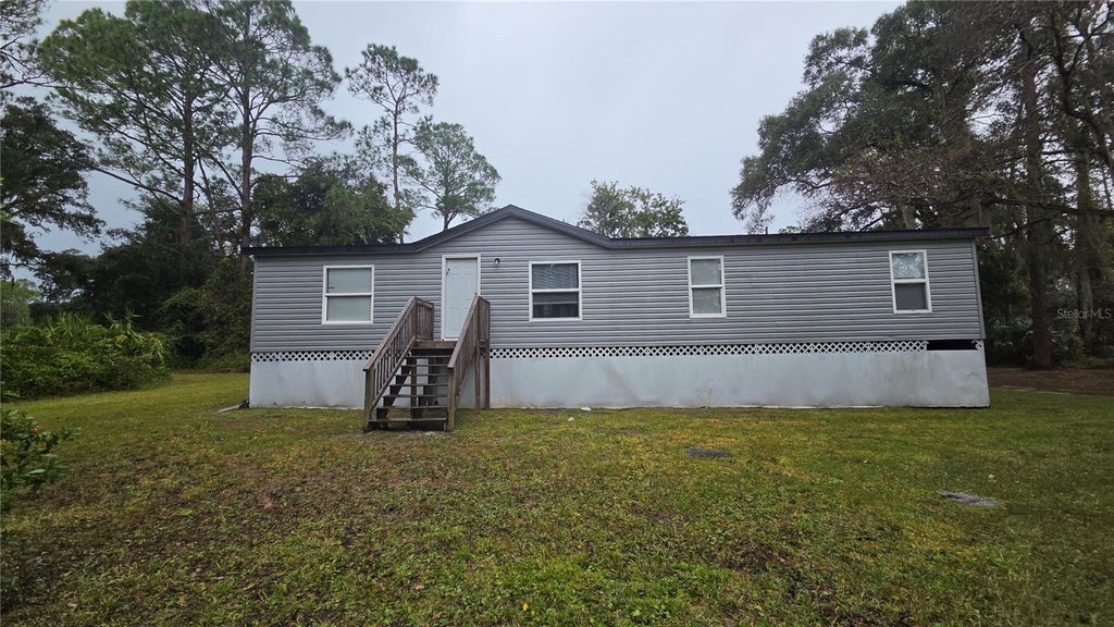 Photo of 2381 Old Daytona Rd, Deland, FL 32724 (MLS # V4952000)
