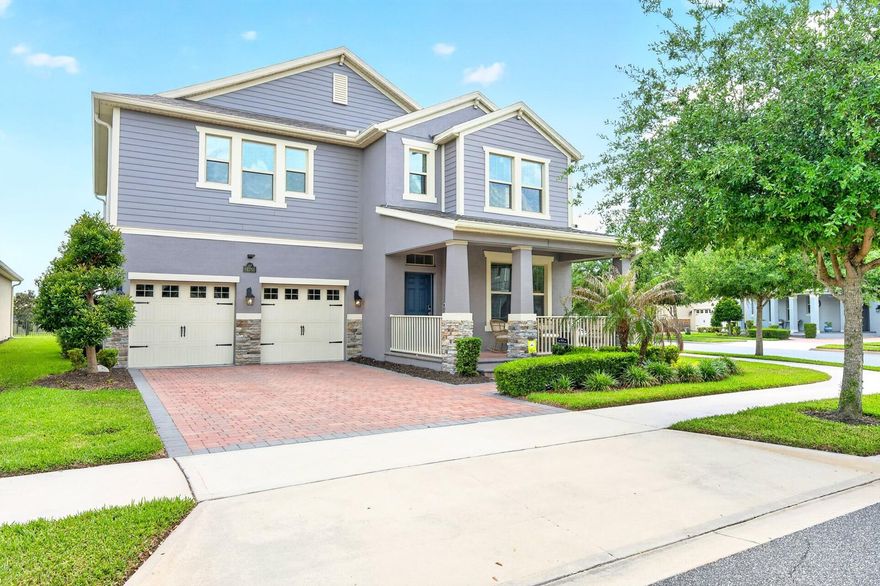 Built in 2019 and loaded with thoughtful UPGRADES, this spacious 4-bedroom, 3-bath home on a desirable .21 ACRE CORNER LOT in the sought-after Waterleigh community of Winter Garden delivers the perfect combination of space, style, and resort style living! Recent improvements include PERMANENT JELLYFISH HOLIDAY LIGHTING (2025), CUSTOM PRIMARY & GUEST BEDROOM CLOSETS (2020), and LUXURY VINYL PLANK FLOORING along with RAIN GUTTERS completed in (2019). From DISNEY FIREWORKS lighting up the night sky to rocket launch views from the Space Coast, this home offers a uniquely Central Florida backdrop you can enjoy right from your own community. The COVERED FRONT PORCH, paver driveway, and lush landscaping create standout curb appeal, while inside a bright, flowing layout welcomes you home. Stylish WOOD LOOK TILE FLOORING runs throughout the main living areas, complemented by carpet and newer LVP flooring in the bedrooms. A versatile formal living or dining space at the front of the home flows seamlessly into the OPEN CONCEPT kitchen, dining, and family room designed for both entertaining and everyday living. The GOURMET KITCHEN is a true centerpiece featuring rich solid wood cabinetry, sleek stone countertops, BUILT-IN STAINLESS STEEL APPLAINCES, a built-in cooktop, decorative backsplash, pantry storage, and a large ISLAND with pendant lighting and bar seating. The spacious family room is filled with natural light from a wall of windows and opens to a COVERED PAVER LANAI complete with a ceiling fan overlooking the backyard, creating an effortless INDOOR/OUTDOOR lifestyle. Also on the first floor is a convenient mud room/drop zone along with a MAIN FLOOR BEDROOM & FULL BATH, ideal for visitors or multi-generational living. Upstairs, a versatile BONUS/LOFT offers additional living space perfect for a media room, playroom, or home office. Your PRIMARY SUITE serves as a relaxing retreat with elegant tray ceilings, a CUSTOM WALK-IN CLOSET, and a beautifully appointed en-suite bath. Two additional bedrooms upstairs share a third full bath. Residents of Waterleigh enjoy unmatched RESORT STYLE LIVING with access to four COMMUNITY POOLS, clubhouses, a 24-hour fitness center, dog parks, mini golf, pickleball, volleyball courts, playgrounds, and scenic walking trails. Located near TOP-RATED SCHOOLS and just minutes from Hamlin Town Center, Winter Garden Village, Disney, SR-429, and major roadways, this home offers the best of modern lakeside living in one of Winter Garden’s most desirable communities. Call today to schedule a tour and fall in love with your new HOME SWEET HOME!