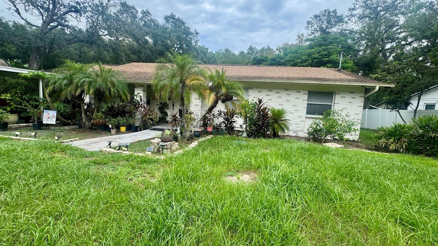 INCREDIBLE OPPORTUNITY IN THE HEART OF TAMPA! Discover this unique property 3 Bedrooms 2 Bathrooms 1 car garage located on a beautiful acre lot located in the heart of Carrollwood. The Real value lies in its expansive lot - 100 x 325 feet! That's plenty of space for future expansion, outdoor living or even building your dream residence. Whether you are an investor looking for a land in a prime area or a homeowner ready to create your own vision, this property offers endless potential.