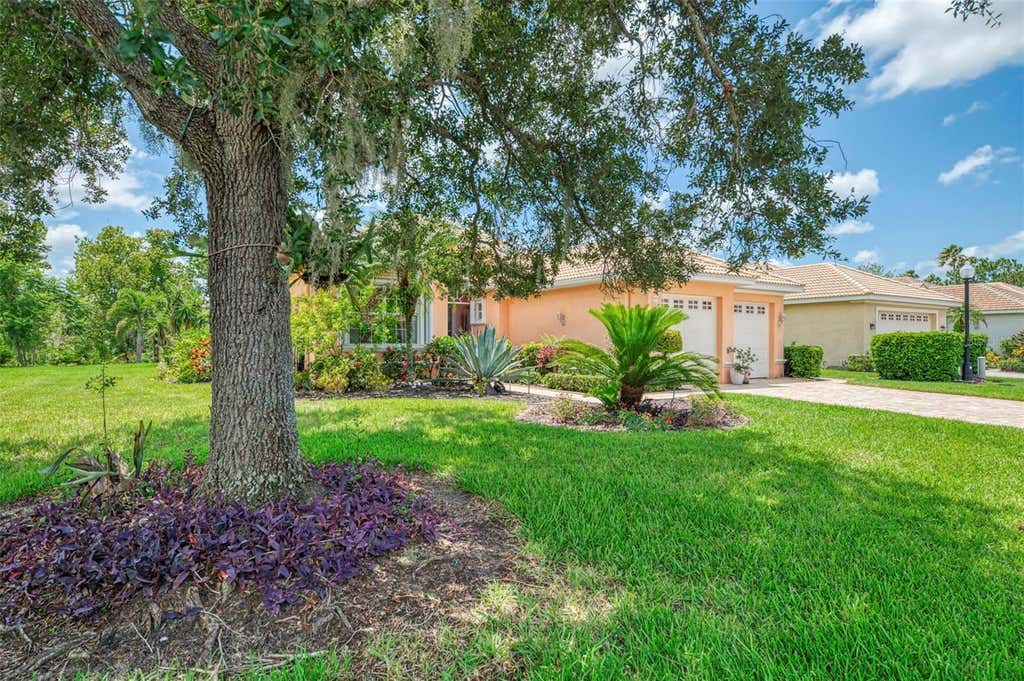 Photo of 5074 Faberge Place, Sarasota, FL 34233 (MLS # A4703616)