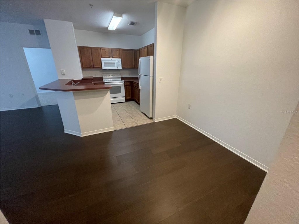 Photo of 8102 Lillies Way #204, Orlando, FL 32825 (MLS # O6449433)
