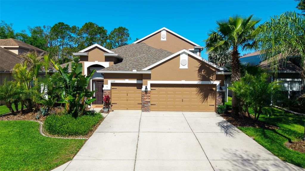 Photo of 11129 Oyster Bay Circle, New Port Richey, FL 34654 (MLS # W7884125)