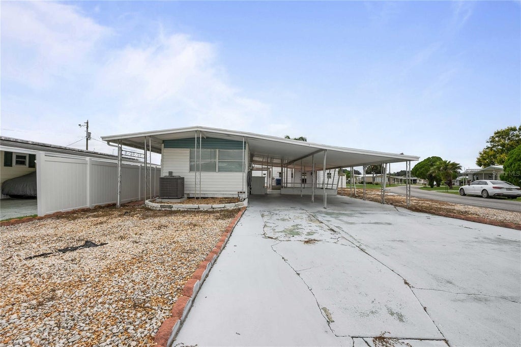 Photo of 37234 Carol Ave, Zephyrhills, FL 33542 (MLS # TB8553657)