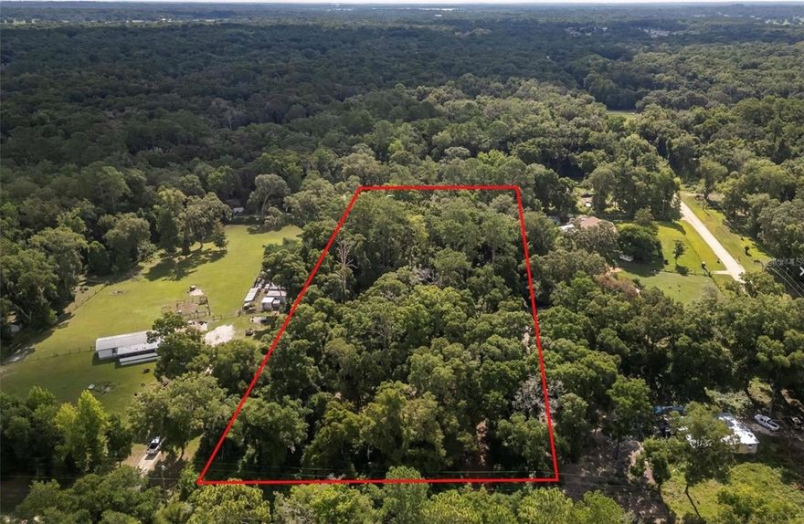 Build your dream home on this beautiful 3-acre parcel of high and dry land ideally located in the heart of Ocala’s renowned Horse Country—just minutes from the World Equestrian Center and HITS Ocala.
Enjoy the perfect blend of peaceful rural living and everyday convenience, with shopping, dining, and outdoor recreation nearby, including the natural beauty of Rainbow Springs State Park.
This property offers open spaces ideal for designing your future home, workshop, or mini-farm setup. Zoning allows for manufactured, concrete block, or stick-built homes, giving you flexibility to build according to your vision.
Improvements already in place include electricity run to the property, plus an existing well and septic, helping streamline your building process.
Whether you’re looking for a private retreat, investment opportunity, or the perfect equestrian base close to world-class competition venues, this property offers exceptional potential.
Don’t miss the opportunity to secure your piece of land in one of Central Florida’s most desirable rural locations.