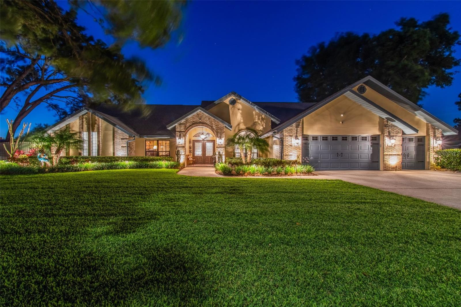 Welcome to one of Valrico’s premier subdivisions—SugarLoaf Ridge! Pride of ownership shows throughout this custom built 4 bedroom, 3 ½ bath, 3 car garage brick home in a double cul-de-sac neighborhood of only 18 executive homes with a low HOA ($500/year) and NO CDD. The home sits on a 1/2-acre lot with impeccably manicured landscaping, fully fenced yard, and a lanai with large pool and spill-over spa visible from almost everywhere in the home. The pool components including propane heater, pool finish, tile, pavers, and pool cage were completely redone in 2022. The interior boasts a roomy living area with a magnificent fireplace (propane or wood burning) as the focal point. The home has a 38 x 21 entertainment/game room with a full bar, a pool table, and extra storage closets. The half bath adjacent to the bar sink area makes easy access for pool guests. The flooring in the main living areas, secondary bedrooms and game room was replaced with luxury vinyl in 2022 The designer kitchen has loads of counter space, custom cabinetry, custom lighting, a deep pantry, cooktop island, self-closing drawers and stainless steel appliances that were replaced in 2022. There is a formal dining room as well as a breakfast nook located off the kitchen. The luxurious, oversized primary suite, complete with beautiful ceramic tile, overlooks the lanai and has new pocket sliding doors that can be opened on a nice day. In addition, the owners have constructed an office right outside of the bedroom. There are two additional bedrooms on the first level plus an additional fully remodeled bathroom. Also on the first level is the interior laundry room with sink and folding area. Upstairs you will find a large loft with extra closet space that could be used for a study or play space, full-size bathroom, and 4th bedroom! New carpet is on the stairwell and in the loft area. The sprinkler system is on a deep well so you can water all you want and maintain a pristine lawn. There are no water/sewer bills due to septic systems (pumped and cleaned in 2023) and well (all well components were replaced in 2021). Solar panels were installed in 2018 and the roof was replaced that year as well. Your average electric bill is only $250. Two of the three A/C units were replaced in 2022 and one A/C unit was replaced in 2020. The home includes a Culligan water filtration and reverse osmosis system. All the windows in the main house have been replaced with double pane energy efficient upgrades. There is a three-car garage with painted acrylic flooring. Really there are too many unique features to mention! This home is charming and you will feel right at home. Homes rarely come available on Sugar Loaf Lane. Put this on your MUST SEE LIST!!