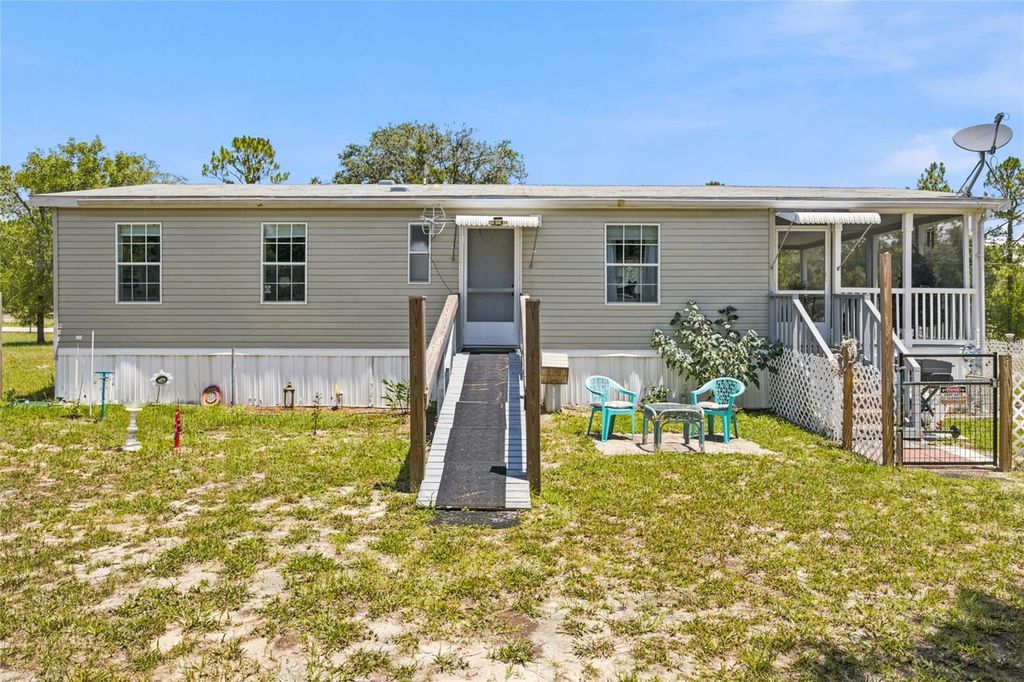 Photo of 13330 SE 21st Place, Morriston, FL 32668 (MLS # OM727258)