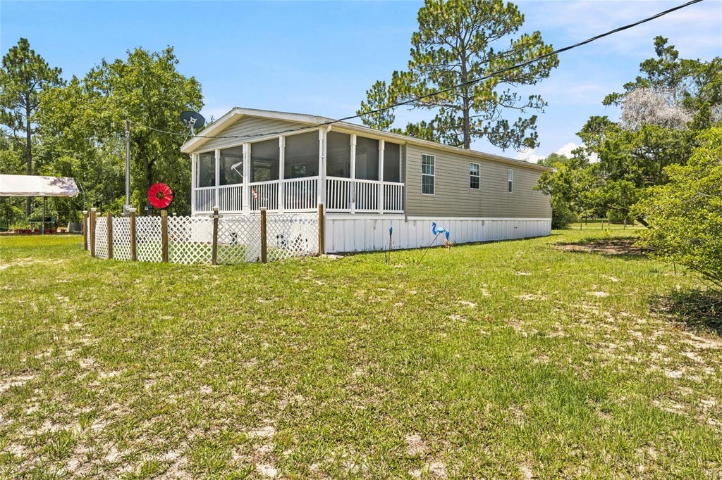 Photo of 13330 SE 21st Place, Morriston, FL 32668 (MLS # OM727258)