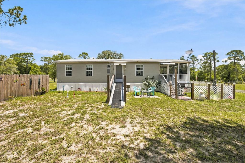 Photo of 13330 SE 21st Place, Morriston, FL 32668 (MLS # OM727258)