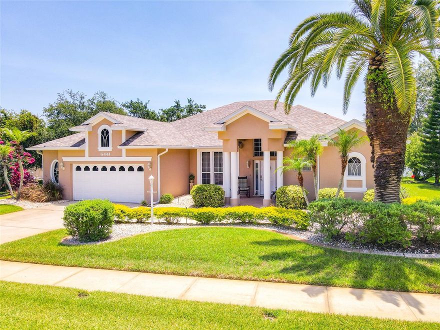 This home radiates all the details that make a difference from curb appeal to the timeless architectural elements inside. Fabulous Pool, Lake and Golf Course views greet you as you enter!  The open floor plan lends itself to multiple entertaining areas. A living room displays a vaulted ceiling, wood look tile floors and sliders to the screened lanai and pool, the dining room is accented by canopy arches to define its space.  Arched doorways lead to the kitchen, casual dining and family rooms all overlooking the spectacular views. The kitchen is sure to please with Quartz countertops, large island with bar seating, plenty of cabinets, stainless appliances and the breakfast nook showcases a block glass separation wall between the nook and family room.  Bedrooms are all situated for privacy with spacious Owner’s suite with sitting, office or exercise area, luxurious bath with two walk-in closets, double sink vanity, separate water closet, soaking tub & walk-in shower.  Expansive covered lanai area along with open decks for sunning surround the solar heated pool complete with privacy screening on the sides and views of the lake and golf course beyond. Two additional bedrooms & baths, laundry room and spacious 2-1/2 car garage round out this beauty, leaving you with a lasting impression. This is truly a home that shows “pride of ownership” …a must see, you won’t be disappointed. ;Water: City