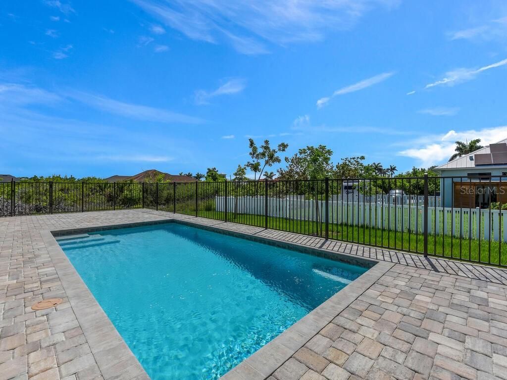 Photo of 10381 Rainsville Street, Port Charlotte, FL 33981 (MLS # O6326991)