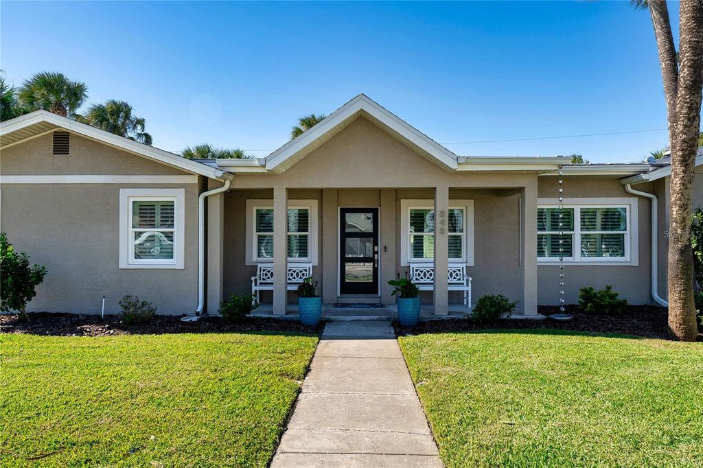 Photo of 848 Mandalay Avenue, Clearwater Beach, FL 33767 (MLS # TB8466825)