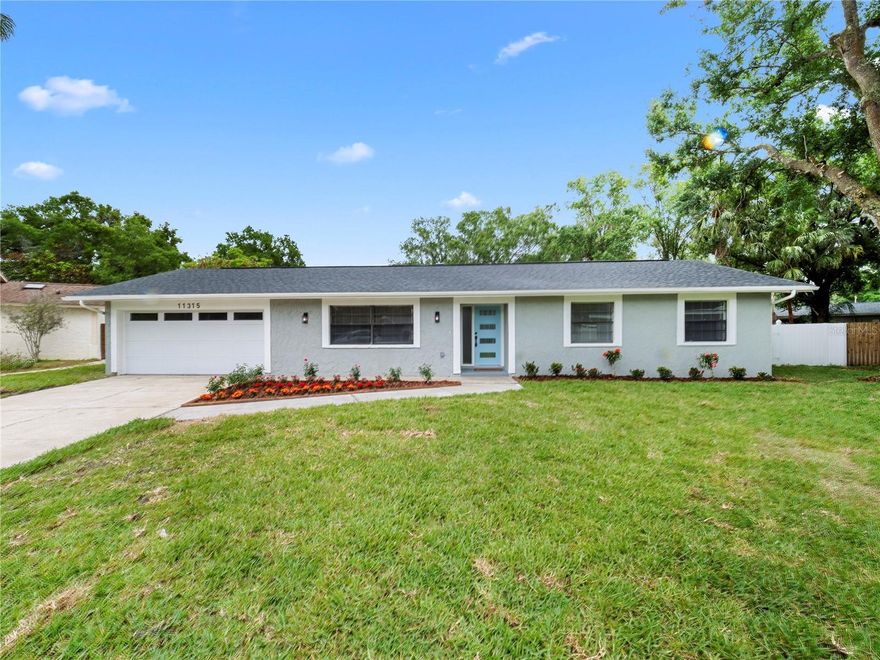 Stunning! Gorgeous! Show Stopper! This beautifully updated 4-bedroom, 3-bathroom Pool home offers an open-concept design that combines modern style with practicality. Upon entering, you'll be greeted by a bright, airy atmosphere enhanced by tasteful finishes and an abundance of natural light and a clear view of the beautiful pool in the backyard. The newly renovated kitchen features elegant cabinetry with expensive flush mount Ceiling Crown Molding, stunning quartz countertops, and high-end stainless steel appliances, creating a perfect space for both cooking and entertaining. The elegant, bold kitchen backsplash and waterfall kitchen paninsula are the quintessential art like pieces in this kitchen that will be talked about for years to come. The gorgeous primary bedroom and En Suite is an oasis to die for;modern wall tiles, frameless shower enclosure; this is a must see! The expansive pavers in the backyard by the pool offers ample space for outdoor gatherings, BBQ and flexibility for family activities and pool parties. Nestled on the peacefin Carrollwood Estates neighborhood, this pool home offers a charming sense of community while being just minutes from Ramond James Stadium, Tampa International Airport, Outback Steakhouse, Cheddar's Scratch Kitchen, Bone Fish and a selection of exceptional local restaurants. Don’t miss the chance to own a piece of Tampa’s history, rich in character and full of potential. Call your Realtor today and take the first step toward making this remarkable property your new home.